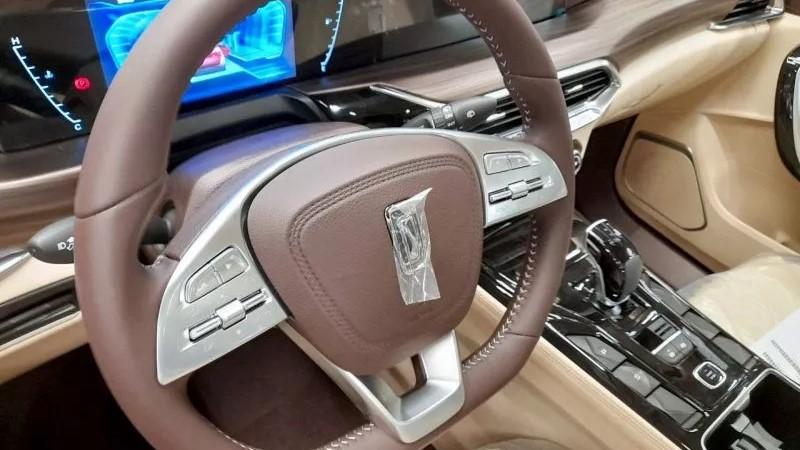 Lada X-Cross 5 производство в России наклейка на руль FAW Bestune T77