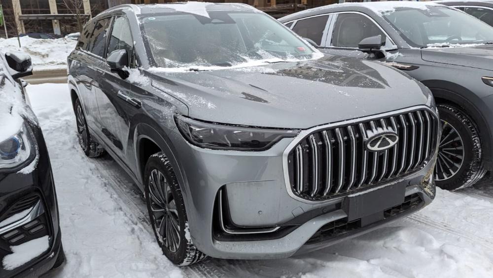 Chery Tiggo 9 вид сбоку в России на стоянке