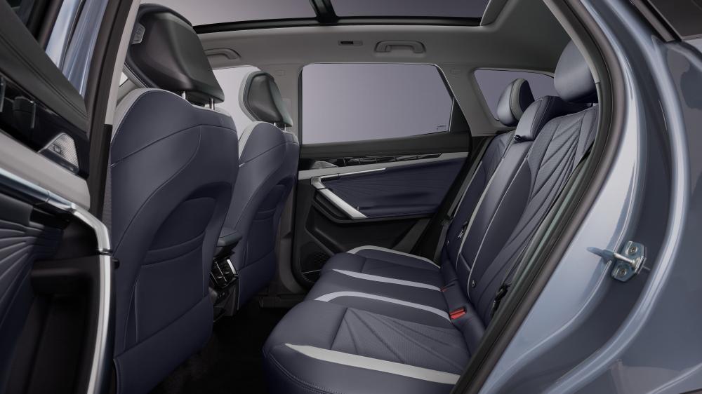 Салон Geely Atlas, интерьер второго ряда