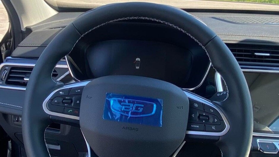 BelGee X70 салон интерьер руль логотип бренда