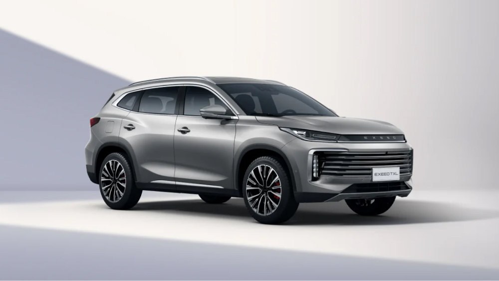 новый кроссовер exeed txl флагман серебристый бок передний 