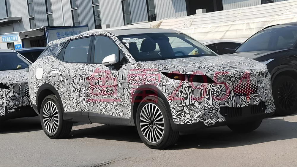 omoda c7 замечен на шпионском фото, камуфляж спереди, салон