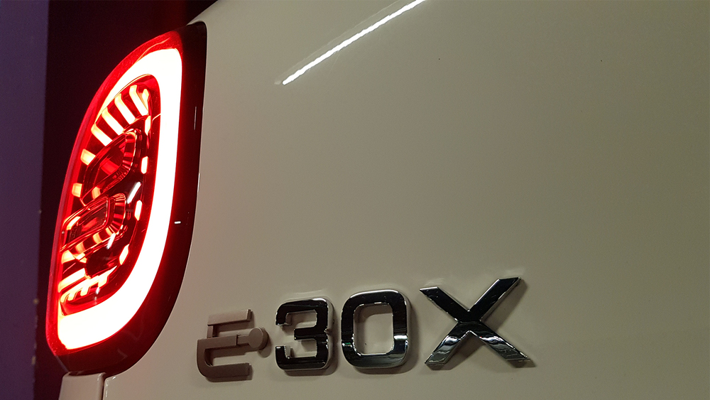 Electric city car JAC E30X in Belarus test rear logo lamp