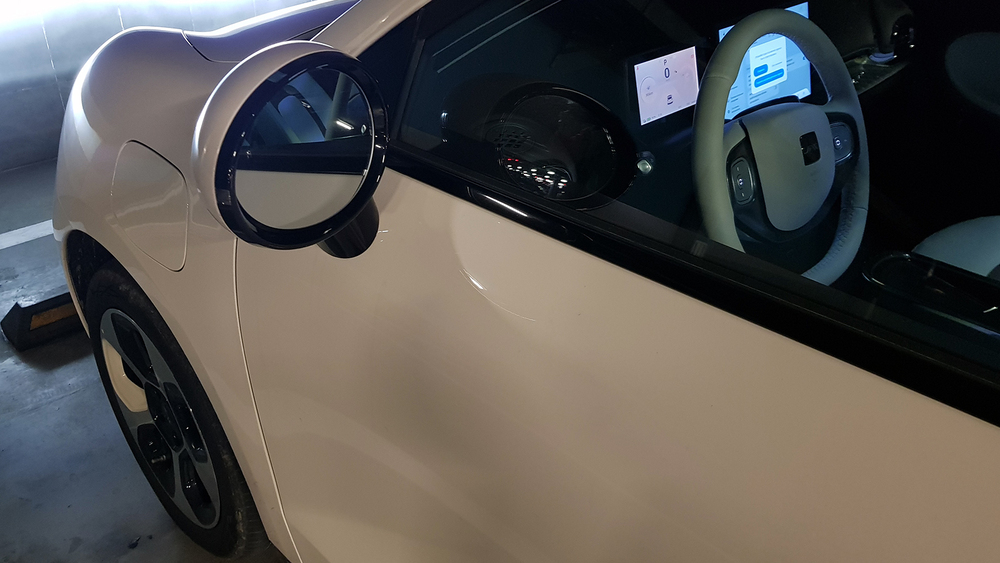 Electric city car JAC E30X in Belarus side mirror test