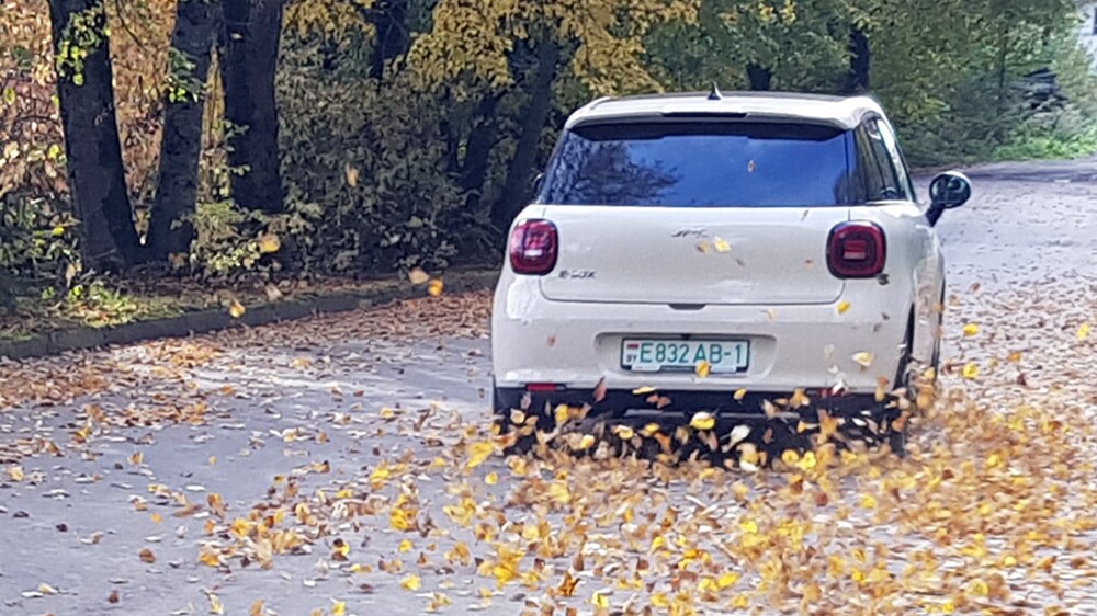 Electric city car JAC E30X in Belarus test from behind in dynamics