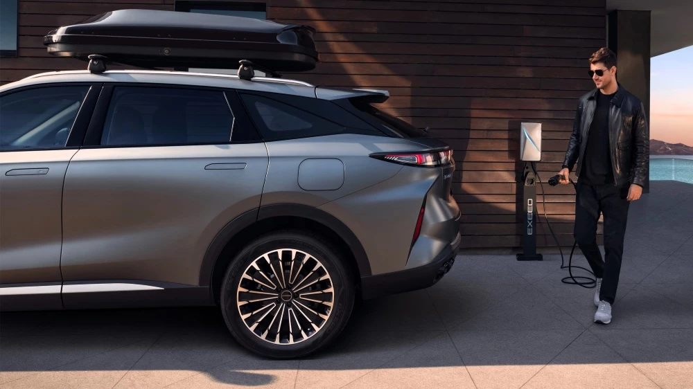 гибридный кроссовер exeed rx phev в Казахстане сбоку